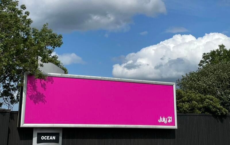 The simple pink billboard shows the power of branding. 